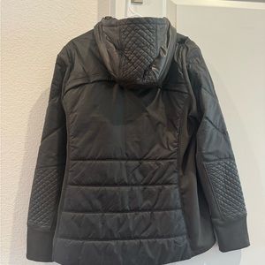 Rarely used Athleta size Large dark green parka. Great condition.